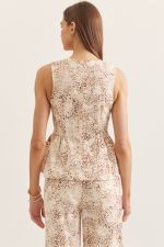 Animal print sleeveless peplum top